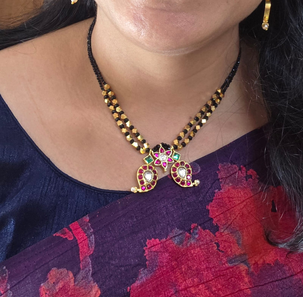 Jadau mango black beads