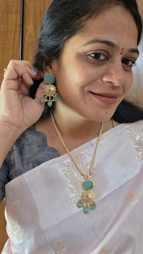 Aditi's Fusion carving gold replica pendant set