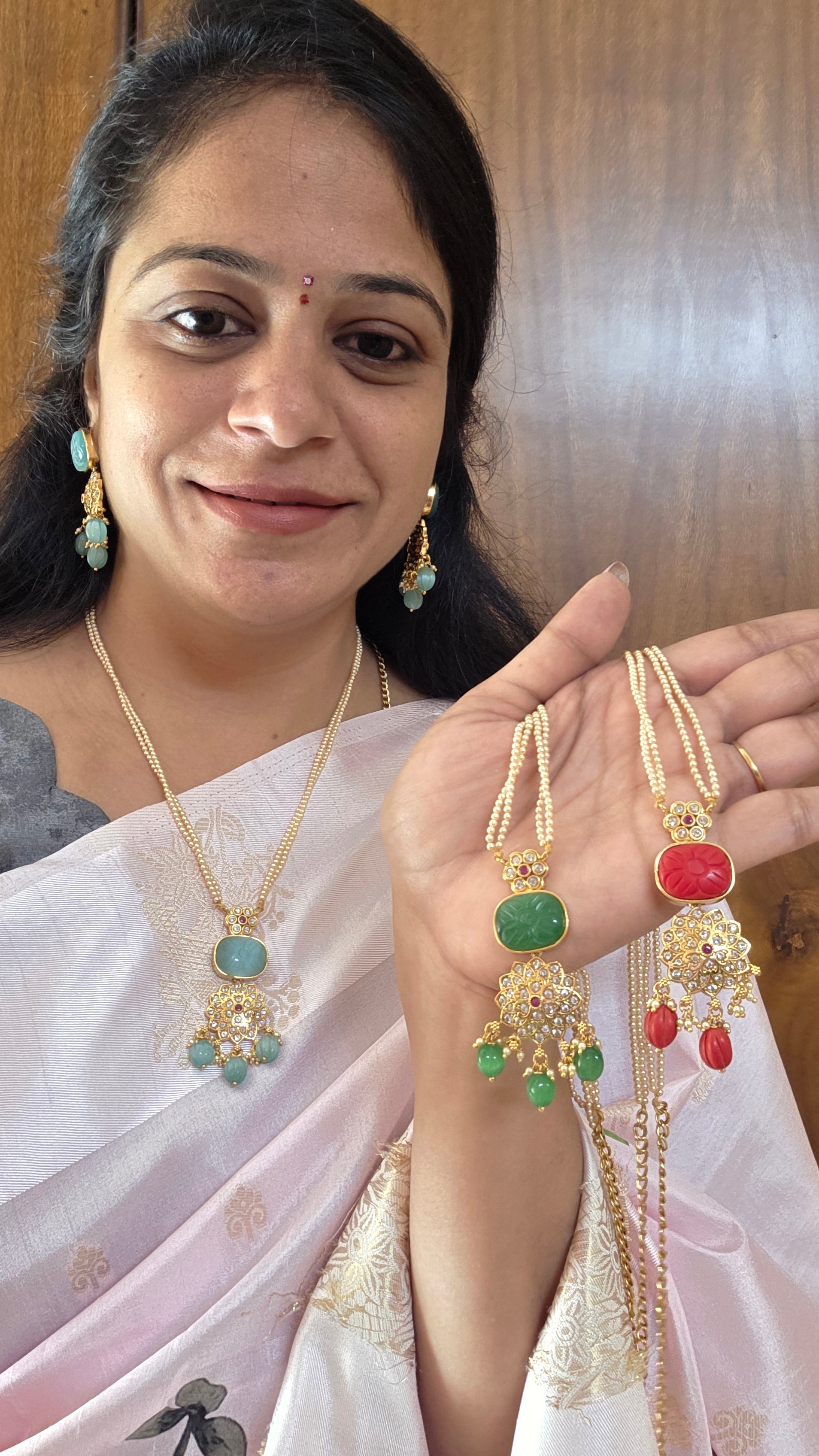 Aditi's Fusion carving gold replica pendant set