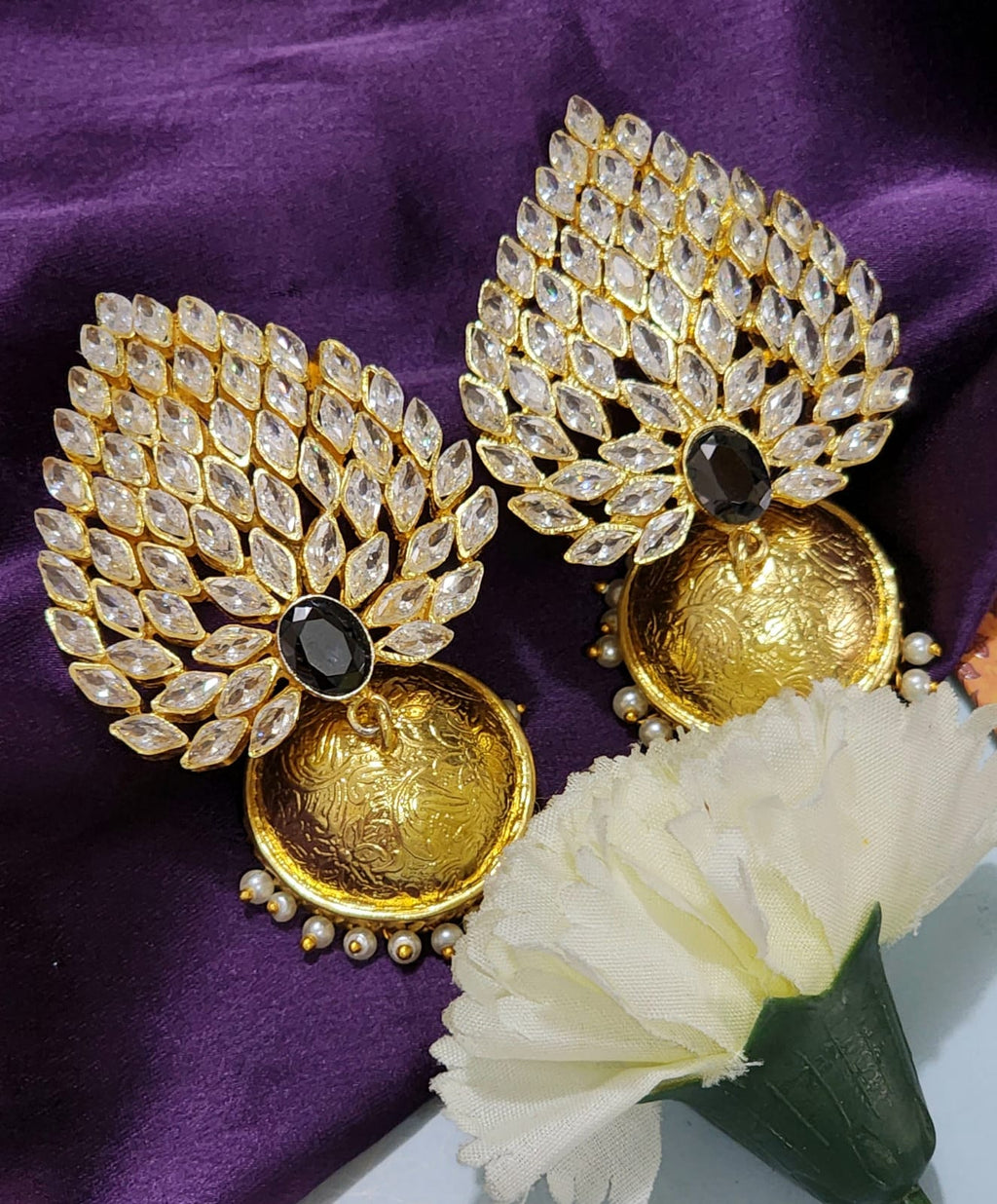 Indraja gaarus uncut diamond earrings