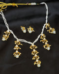 Kundan asymetric pearl neckchain with earrings